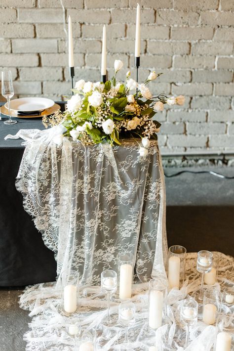 nontraditional sweetheart table design, draped lace with candle pillars on floor. Withinsodo wedding reception. Real wedding inspiration. Seattle washington wedding photographer Sweetheart Table Candles, Lace Tablecloth Wedding, Wedding Floor Plan, Candle Pillars, Rooftop Ceremony, Candles And Flowers, Draping Wedding, Sweetheart Table Wedding, Flower Installation