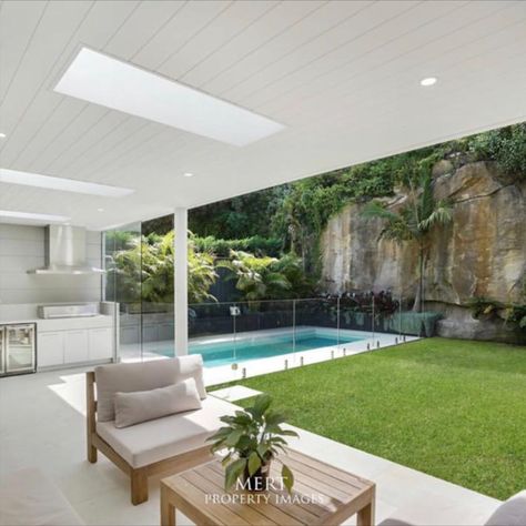 The perfect outdoor entertaining space in Mosman: lush green grass, outdoor kitchen and seating area, tropical landscaping and, of course, a Blue Haven Pool.

📸  by Mert Property Images Outdoor Entertaining Area Pool, Pool Entertainment Area, Modern Queenslander, Garden Pool Design, Blue Haven Pools, Outdoor Entertainment Area, Living Pool, Open House Plans, Entertaining Space