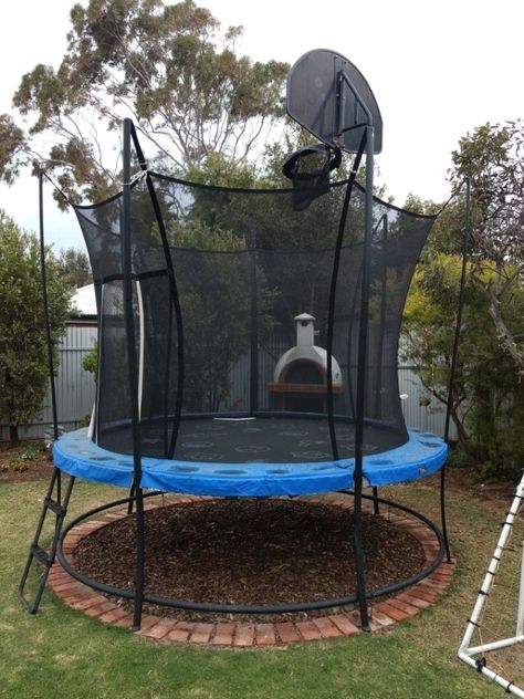 Cool Trampoline Ideas, Rocks Under Trampoline, Landscaping Under Trampoline Ideas, Above Ground Trampoline Landscaping, Trampoline Base Ideas, Under Trampoline Ideas Backyards, Gravel Under Trampoline, Backyard Trampoline Landscape, Under Trampoline Landscaping