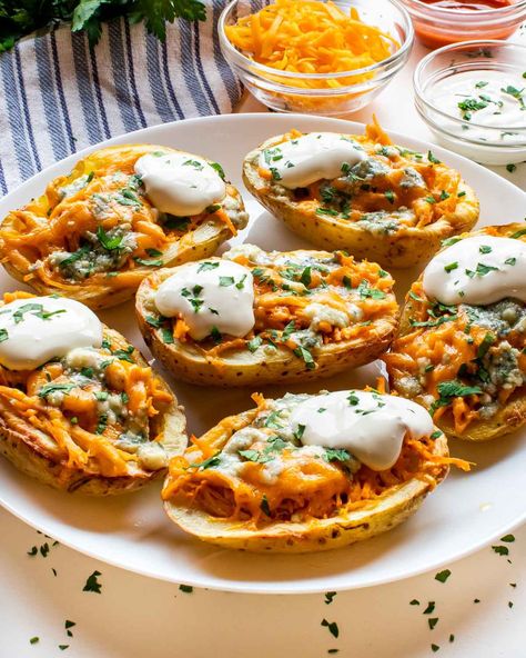 These Buffalo Chicken Potato Skins are delectably spicy and cheesy! They're perfect for your next get-together or game day! Buffalo Chicken Sweet Potato, Buffalo Chicken Potato, Sweet Potato Stuffed, Potato Stuffed, Chicken Potato, Chicken Sweet Potato, Chicken Potatoes, Potato Skins, Buffalo Chicken