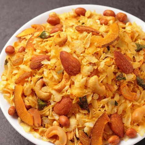 1.1M views · 14K reactions | In Just 2 Spoons Of Oil Make This No-Fry Poha Namkeen For Diwali | In Just 2 Spoons Of Oil Make This No-Fry Poha Namkeen For Diwali | By Aarti Madan | Facebook Raw Peanuts, Dry Coconut, Dry Snacks, Party Finger Foods, Tea Time Snacks, Curry Leaves, Finger Foods, Pasta Salad, Spoons