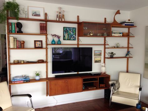 Mid century, teak wall unit. Mid Century Wall Mounted Shelves, Mcm Entertainment Wall, Mid Century Modern Media Wall, Mid Century Wall Unit With Tv, Vintage Wall Unit, Mid Century Media Wall, Midcentury Wall Unit, Mid Century Modern Wall Unit, Mcm Tv Wall