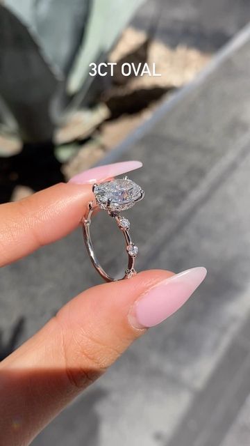 Golden String Inc on Instagram: "Just finished combining two of our most loved features in this beauty 😍 •3ct Oval Diamond set on our Spaced Diamond Band + Hidden Halo💎 The rings on our feed are custom therefore aren’t listed on our website! The best way to order is through DM, Email, or Phone. Available in both Natural and Lab Diamond -Please Message All Price Inquiries✨ #haloring #ovalengagementring #hiddenhaloengagementring #ovalhiddenhalo #ovaldiamond #ovalshapehaloring #3caratdiamond # Spaced Diamond Engagement Ring, Oval Engagement Ring Spaced Diamonds, Spaced Diamond Band, Oval Engagement Ring Secret Halo, Oval Engagement Ring With Spaced Out Diamond Band, Oval Engagement Ring With Hidden Halo And Diamond Band, Oval Engagement Ring With Side Stones And Hidden Halo, Oval Diamond Rings Hidden Accent, Most Beautiful Engagement Rings