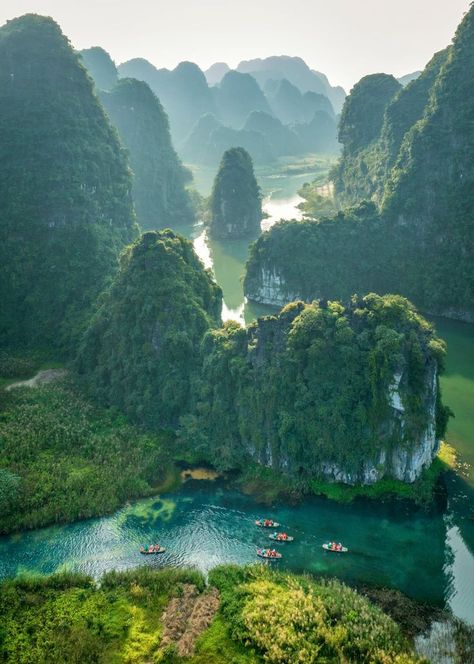 From the foggy limestone mountains of Trang An to grass collection in Bao Loc, the scenic shots by Pham Huy Trung preserve Vietnam’s heritage. Cuc Phuong National Park, Foggy Mountains, Aerial Photos, Halong Bay, Drone Photos, Aerial Photo, Vietnam Travel, Scenic Landscape, Aerial Photography