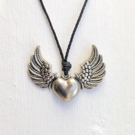 Flying Heart Wing Punk Necklace/Choker Adjustable Necklace Ft. A Dainty Antique Silver Angel Heart Wing (Approx. 1.5” Wide) Placed On A Black Waxed Polyester Cord. Finished W/ Sliding Knot Closure. : Adjustable Knot! (Opens Up To 26") Made Of Durable Zinc Alloy #: Handmade Necklace Healing Crystals Jewelry Metaphysical Stones Gemstones Rocks Reiki Energy Meditation Yoga Protection Earthcore Witchy Wicca Magick Occult Oddities Tarot Slytherin Hobbit Elf Handmade Bracelet Boho Romantic Goth Fairy Silver Grunge Necklace, Witchcraft Necklace, Crow Skull Necklace, Metal Heart Necklace, Heart With Wings Necklace, Y2k Star Necklace, Grunge Gold Jewelry, Open Necklace, Y2k Emo Jewelry