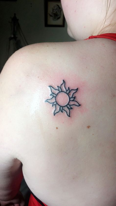 Finally got my Tangled tattoo! Mini Tangled Tattoos, Rapenzul Tattoo, Tangled Golden Flower Tattoo, Tiny Tangled Tattoo, Repunzal Tangled Tattoos, Tangled Rapunzel Sun Tattoo, Tangled Star Tattoo, Tangled Theme Tattoo, Rapunzel Themed Tattoos