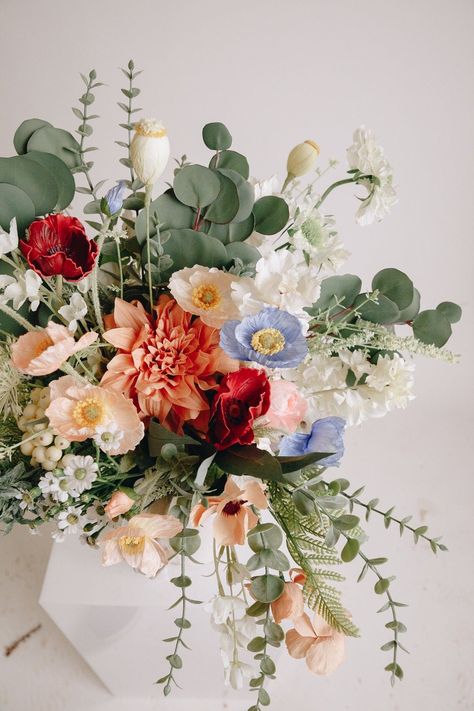 Stunning artificial peonies, eucalyptus, and mini daisies create a romantic beauty perfect for an intimate moment! This gorgeous faux floral bouquet is made with peonies and mini daisies with eucalyptus. They are perfectly finished with (ribbon or paper). Who said that artificial flowers aren’t as elegant as fresh? Artificial flowers are beautiful, and they stay fresh all season! You can have gorgeous blooms on your wedding day or any special occasion, be it anywhere in the world! Dimensions: Br May Wedding Colors Spring, September Wedding Bouquets, Wedding Color Ideas Summer, Wild Flower Wedding Theme Color Schemes, Summer Wildflower Bouquet, Romantic Spring Wedding Ideas, March Wedding Flowers, Spring Boho Wedding, Spring Flowers Wedding