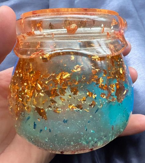 ✨Wycks stash it✨ is the perfect way to store your herbs or any small item.  This beautiful stash jar is a screw top to keep your contents extra secured in its place. This jar was created using resin, accented with glitter, flakes, with mix colorant base.  Measurements: Base 3.3in Top: 2.6/2.95 with top  Length: 3.35in  PLEASE NOTE: Given that these items are handcrafted, there may be small imperfections present (i.e., lint, minor bubbles, chipping, etc.) I use REAL flowers and leaves so please understand that not every flower/petal/leaf will be perfect--we think this adds to the beauty and uniqueness of your handmade item. This is one of a kind and no two stash it jars are exactly alike. Hand wash only.  Please contact me with any questions or if you have any problems with your order. Stash Jar, Flower Petal, Flowers And Leaves, Real Flowers, Herbs, Hand Wash, Beauty