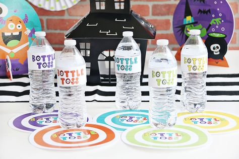 Bottle Flip Game, Class Halloween Party, Bottle Flip, Halloween Class Party, Halloween Bottles, Bottle Wrappers, Party Planning Ideas, Halloween Party Games, Classroom Inspiration