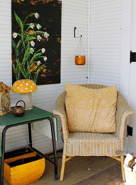 Quirky Porch Decor, Dog Yard, Wood Lantern, Rattan Table, Wood Scraps, Wood Basket, Citronella Candles, Yellow Pillows, Green Table