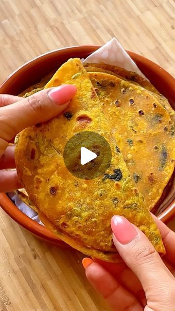 Sweety Oukabay Raithatha on Instagram: "THEPLA

Ever tried Gujarati Thepla? This delicious, spiced flatbread is the ultimate travel snack! 🌍✨ Packed with flavour, easy to make, and stays fresh for days, perfect for journeys and a taste of home on the go. 🙌

Watch as we whip up the perfect Thepla: kneading, rolling, and cooking to golden perfection.🫓✨ Would you pack these for your next trip? Let us know below! 👇

✨ Save this recipe for your next adventure and share it with your travel buddy! ✈️❤️

Ingredients:
-2 cups whole wheat flour
-1/4 cup gram flour
-1/4 cup yoghurt
-1 tbsp garlic paste
-1 tbsp ginger paste
-1 tbsp chilli paste
-1 tbsp jaggery
-1 tsp kashmiri chilli powder
-1/4 tsp asafoetida
-1 tsp turmeric powder
-salt, according to your taste
-1/2 cup fresh fenugreek
-1 tbsp dr Thepla Recipe, Gram Flour Recipes, Flaky Roti Recipe, Flaky Roti, Com Ga Roti Recipe, Recipes With Ragi Flour, Whole Wheat Chapati, Barley Flour, Gram Flour