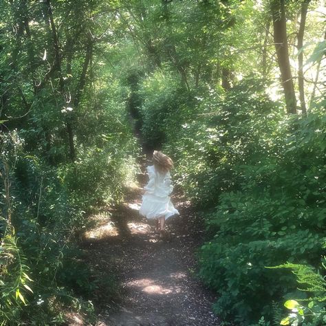 Girl running in the forest Running In Garden Aesthetic, Running Forest Aesthetic, Fairy In The Woods Photoshoot, Running In Grass Aesthetic, Dancing In A Forest, Dancing In The Forest Aesthetic, Running Through Forest Aesthetic, Running In Nature Aesthetic, Running In Woods Aesthetic