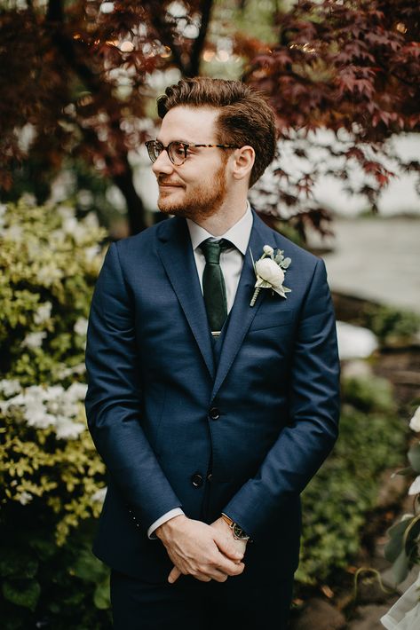 navy suit emerald green tie white ranunculus boutonniere garden outdoor wedding in Franklin Tennessee near Nashville Venue: CJs Off the Square Photographer: Janelle Elise Photo Navy Blue Suit With Emerald Green Tie, Navy Suit Tie Ideas, Navy Suit Wedding Green Tie, Blue Suit Green Tie Wedding, Navy Suit Dark Green Tie, Navy Suit Olive Green Tie, Navy Suit With Green Tie, Navy And Green Suit, Dark Blue Suit Green Tie