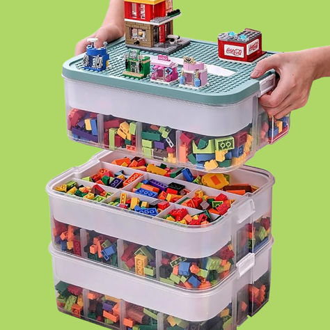 Keep your LEGO collection neat and tidy with the Stackable & Compartmentalized Storage Organizer. This efficient organizer features multiple compartments, allowing you to sort bricks by size, color, or type. Its stackable design saves space and keeps your building area clutter-free. Durable and easy to use, it's perfect for LEGO enthusiasts of all ages. #LEGOStorage #OrganizationHacks #ToyOrganizer #LEGOAddict #ad Kids Lego Storage, Lego Storage Organization, Childrens Toy Boxes, Lego Organization, Lego Boxes, Kids Toy Boxes, Toy Storage Organization, Lego Storage, Toy Storage Boxes