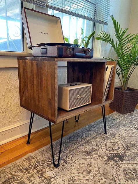 This record player and vinyl stand/cabinet is the perfect addition to any music-lover's home. It is a timeless piece made of sturdy pine solid wood and has sleek metal hairpin legs for an elegant touch. Best of all, you won't need any tools to assemble, as it arrives already assembled-just screw in the legs and you're done! Record Player Furniture, Vintage Stereo Cabinet, Vinyl Cabinet, Vinyl Record Furniture, Record Player Table, Record Player Cabinet, Vinyl Room, Stereo Cabinet, Record Player Stand