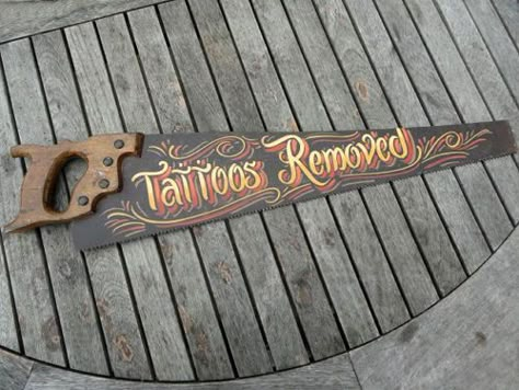 FANTASTIC VINTAGE TATTOOS REMOVED SIGN TATTOO SHOP PARLOUR SAW ADVERTISING G | eBay Tattoo Remover Saw, Tattoo Sign, Tattoo Shop Interior, Tattoo Shop Decor, Tattoo Studio Interior, 16 Tattoo, Pinstripe Art, Single Line Tattoo, Meaningful Tattoos For Women