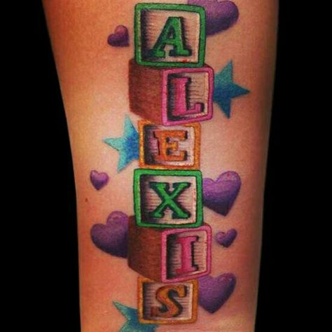 Kids name in blocks tattoos&piercings Mama Tattoos, Grandchildren Tattoos, Tattoo Hearts, Tattoo For Baby Girl, Kid Name Tattoo, Baby Name Tattoos, Full Tattoo, Tattoo Shoulder, Tattoos With Kids Names