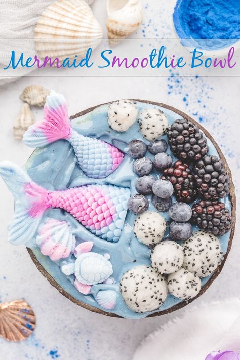 Dive into a mermaid adventure with this Mermaid Smoothie Bowl! Perfect for mermaid themed parties and little mermaid enthusiasts, this magical creation features a swirl of blue spirulina superfoods goodness. The DIY mermaid tails, crafted from frozen yogurt and natural colorings, add a touch of whimsy to your mermaid party food spread. Get ready to make a splash at your next mermaid themed party with this easy-to-make and health-packed treat. Your little mermaid's dreams will come true.  via @cmpollak1 Acai Bowl Toppings, Mermaid Smoothie, Mermaid Bowl, Two Mermaids, Mermaid Party Food, Outdoor Entertaining Ideas, Mermaid Food, Diy Mermaid Tail, Summer Entertaining Recipes