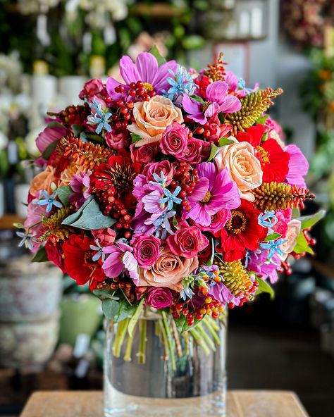 Mateusz Wasak | This colorful bouquet is bursting with vibrant hues of pink, purple, and orange, combining roses, cosmos, and berries. The dynamic mix of… | Instagram Colorful Roses Bouquet, Pink And Purple Wedding Flowers, Red Purple Wedding, Pink And Purple Wedding, Pink Flower Bouquet, Berry Wedding, Hot Pink Flowers, Beautiful Bouquets, Purple Wedding Flowers