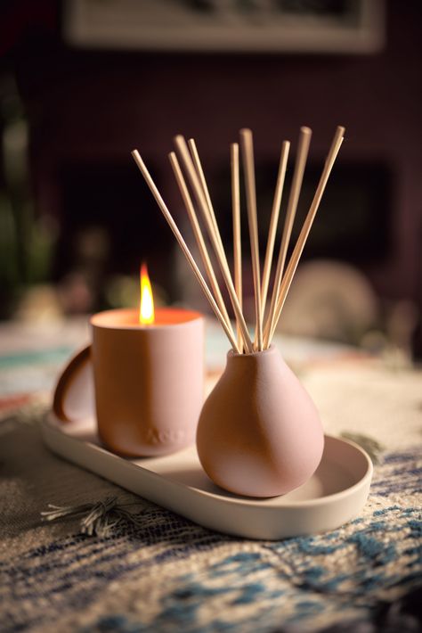 [description] The Fernweh collection by Aery Living is an expression of the intense desire to travel and explore! The Aery essential oils transport you to far off destinations. This exotically sweet and musky fragranced reed diffuser will transport you to warmer climates. With its pretty peachy pink vessel perfect for reusing. Tuberose was traditionally picked at dawn when its fragrance was at its best. We've captured this by combining florals, sweet peach and silky-smooth almond milk. 200ml Dif Reed Diffuser Design, Honey Packaging, Scented Candles Luxury, Scent Diffuser, Reed Diffusers, Soft Rose, Sweet Peach, Luxury Fragrance, Porcelain Clay