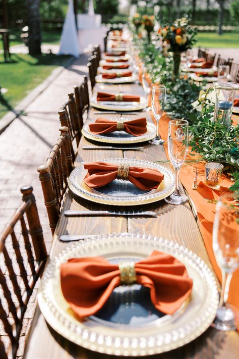 Outdoor ceremony & reception at Venue at the Grove in Phoenix, Arizona. Fall/Autumn Wedding Theme with burnt orange, rust, and bronze colors, lots of greenery. Romantic tablescapes, wedding place settings, boho table decor, boho wedding table decor, wedding table decor, wedding centerpieces, wedding florals, wedding reception. Photography by Tony George Photography. Burnt Orange Weddings Decorations, Autumn Wedding Theme, Boho Wedding Table Decor, Table Decor Boho, Orange Wedding Decorations, Boho Table Decor, Tablescapes Wedding, Boho Wedding Table, Bronze Wedding