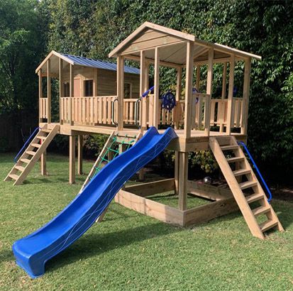 Fort Playhouse, Small Playhouse With Slide, Playhouse Plans With Slide, Playhouse With Bridge, Kids Playset Outdoor, Diy Wooden Fort Playhouse Plans, Daycare Playground, Outdoor Forts, Cubby House Ideas