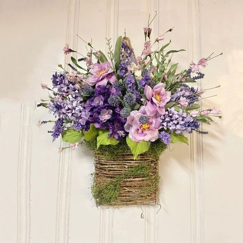 PRICES MAY VARY. 【Basket Style Wreath】This gorgeous, vintage-inspired spring door wreath is the perfect addition to your home decor.This hanging basket is perfect for weddings, parties, birthdays or just for everyday decor and more! 【Wildflowers Door Hanging Basket Wreath】: Classy, Victorian, Country Charm...this Basket Hanger Style works well for so many décor options! Spring & Summer Seasons. 【Made of High Quality Materials】Rattan Hanging Basket wrapped with a beautiful burlap ribbon bow. It w Hanger Basket, Lavender Basket, Basket Wreath, Traditional Wreath, Mothers Day Wreath, Lavender Wreath, Spring Door Wreaths, Flower Bucket, Spring Door