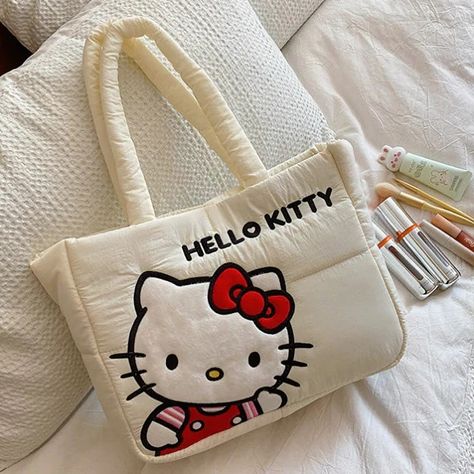 Sanrio Puffer Tote Bag available for preorder. $300TTD Puffer tote is filled with cozy down, and its double lining adds extra protection for your belongings. *This is a pre order Item and the estimated arrival is 2.5-3 weeks from the date we place the order for the item. Pre order items require a 75% down payment. Deadline: June 15th Genuine Product Dimensions : 34cm x 23cm x 11cm Can fit laptops, iPad, books & other essentials •To order one, visit our website or send us your name, con... Sanrio Embroidery, Embroidery Characters, Sanrio Characters Kuromi, Eco Materials, Fabric Tote Bag, Mummy Bag, Hello Kitty Bag, Fabric Tote Bags, Fabric Tote