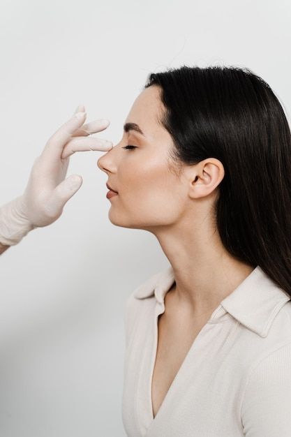 Photo rhinoplasty is reshaping nose surg... | Premium Photo #Freepik #photo Cosmetic Nursing Aesthetic, Plastic Surgery Branding, Rhinoplasty Aesthetic, Nose Aesthetic, Botox Aesthetic Photography, Plastic Surgery Aesthetic, Extreme Plastic Surgery, Face Plastic Surgery, Rhinoplasty Surgery