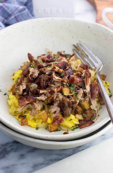 Combine your love of BBQ with breakfast in this BBQ Pulled Pork Breakfast Bowl. Scrambled eggs, bacon, onions, and potatoes combine with BBQ pulled pork in this customizable recipe. It's a great use of leftover pulled pork! Pulled Pork Omelette, Rib Leftover Recipes, Pork Breakfast Recipes, Pulled Pork Breakfast, Egg Over Rice, 2023 Meal Plan, Pork Leftovers, Scrambled Eggs Bacon, Pork Breakfast