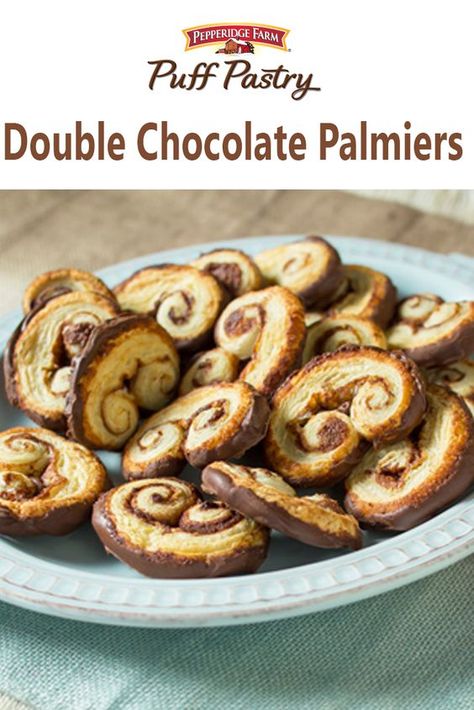 Puff Pastry Double Chocolate Palmiers Recipe. You're in for a real treat with these palmier cookies featuring sweetened Puff Pastry that is baked until golden and finished with a dip in melted chocolate. They're easy, elegant and sure to make an impressive addition to your holiday table. Chocolate Palmiers, Palmiers Recipe, Palmier Cookies, Small Cookies, Pepperidge Farm Puff Pastry, Pepperidge Farm, Puff Pastry Sheets, Pastry Sheets, Flaky Pastry