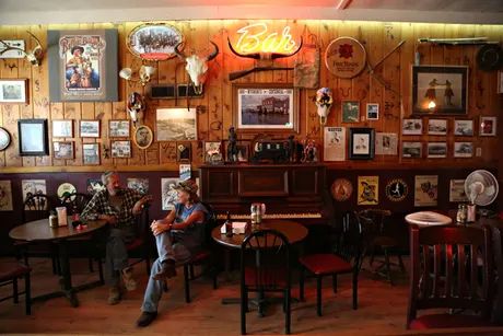 Rocky mountain road trip | Travel | The Guardian Honky Tonk Bar, Cowboy Cafe, Country Bars, Denver Bars, Mountain Road Trip, Horseshoe Bar, Cowboy Bar, Cowboys Bar, Western Bar