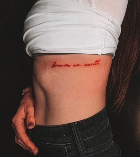 Red Dainty Tattoos For Women, Red Script Tattoos For Women, Red Simple Tattoos, Back Tattoo Women Red Ink, Back Tattoo Script, Red Text Tattoo, Back Script Tattoo, Small Red Tattoos For Women, Script Back Tattoo