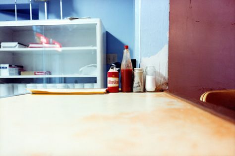 William Eggleston. Classic image of the dining room/kitchen table. Just like our own in my share house we always have the salt and pepper as well as the tomato sauce sitting on it as they are regularly used by the house. I like the way Eggleston has shot this from the far side of the table looking along it and playing the condiments in the centre. A lovely shot that i feel i'll be able to appropriate for my series. Patrick Tosani, Andreas Gursky, James Rosenquist, Lee Friedlander, Walker Evans, William Eggleston, Gordon Parks, Martin Parr, Sofia Coppola