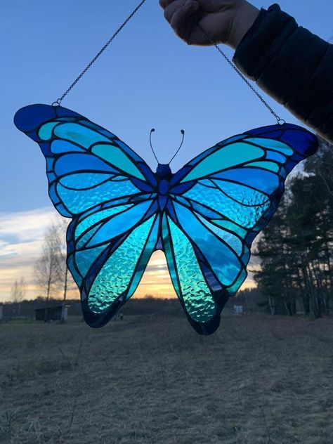 Decoration in your home or garden and unique housewarming gift. You've never seen such a beautiful Butterfly in your life. Make a stylish housewarming present for your friend or family! This butterfly will fly always with you even you do not believe it :) Blue stained glass butterfly brings to your home peace, love and only positive emotions! Size: 40 x 28 cm (16 x 11 inches) Please, note: this item is handcrafted - glass could slightly differ. --Estimated shipping times-- Europe- 7-14 business Outdoor Couch Diy, Stained Glass Blue, Making Stained Glass, Stained Glass Butterfly, Stained Glass Decor, Stained Glass Window Hanging, Homemade Decor, Stained Glass Crafts, Glass Butterfly