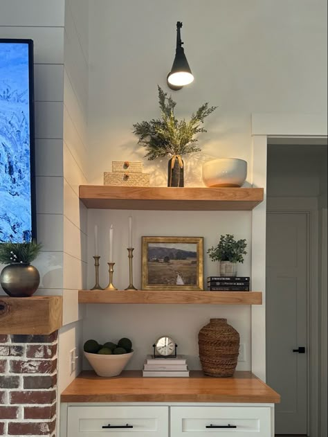 Dining Room Cabinet With Floating Shelves, Shelves On Large Wall, Floating Shelves With Sconces Above, Modern Farmhouse Floating Shelf Decor, Mounted Shelves Living Room, Floating Shelves On Shiplap Wall, Modern Floating Shelves Living Room, Styling Floating Shelves Living Room, Floating Shelves Dining Room Wall