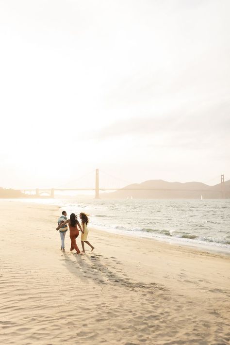 A son, mother and daughter hold hands while walking on the beach next to the Golden Gate Bridge San Francisco Family Photoshoot, Sunset Family Photos, San Francisco Beach, Beach San Francisco, San Francisco Photos, 2024 Ideas, California Sunset, Beach Family Photos, The Golden Gate Bridge