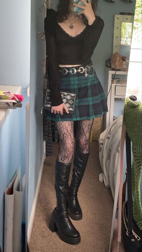 black top, plaid mini skirt, patterned tights, leather platform boots, silver jewellery, whimsigoth moon belt, book Plaid Mini Skirt Outfit Summer, Black Plaid Skirt Outfit, Whimsigoth Moon, Plaid Mini Skirt Outfit, Mini Skirts Outfits Summer, Moon Belt, Gig Outfit, Black Plaid Skirt, Goth Vibes