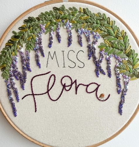 7 shades of purple for this wisteria order 💜 How sweet is that tiny little robin! #floralembroidery #wisteria #handembroidery #keepsakes #handmadegifts #embroidered #robin #dmcthread Wisteria Embroidery Design, Embroidered Wisteria, Wisteria Embroidery, Embroidered Robin, Purple Wisteria, Embroidery Stitches Tutorial, February 13, Embroidery And Stitching, Wisteria