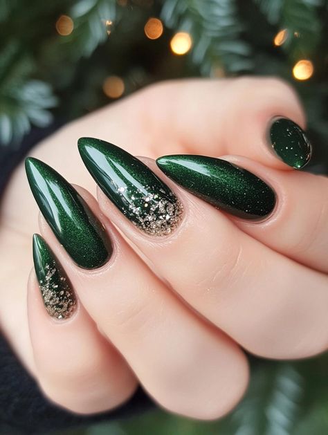 Green Christmas Nails 2025: Festive and Trendy Holiday Designs Holiday Green Nails Christmas, Christmas Nails Inspiration Green, Christmas Nails Green Almond, Dark Green Nails With Sparkle, Sparkle Nails Green, Forest Green And Silver Nails, Dark Green Nails Christmas, Emerald Green And Silver Nails, Dark Green And Silver Nails