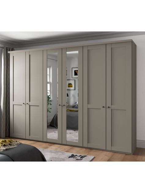 The elegant and classic look of our Marlow range suits most decor. Versatile and practical as a bedroom storage solution, the range is available in a choice of finishes: matt Off White, matt Havana and matt Pebble Grey, and either with or without mirrors. The exterior is complemented with an attractive cornice detail at the top and hinged doors with handles in a vintage pewter finish. This wardrobe's two middle doors have exterior mirrors. The interior has three double compartments with two shel Built In Wardrobe With Mirror, Fitted Wardrobe Ideas With Mirror, Wardrobe Exterior Design, John Lewis Marlow Wardrobe, Panelling Wardrobe Doors, Elegant Wardrobe Design, Sharps Bedrooms Fitted Wardrobes, Inbuilt Wardrobe, Built In Wardrobes Bedroom