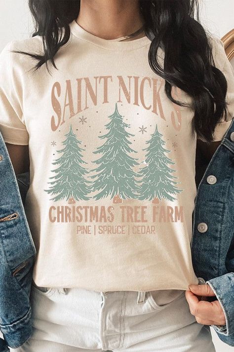 SAINT NICK'S CHRISTMAS TREE FARM UNISEX SHORT SLEEVE,GRAPHIC TEE,GRAPHIC TSHIRTS,TSHIRTS,TEES100%COTTON,HEATHER(52%COTTON,48%POLY),ATH.HEATHER,BLACK HEATHER(90%COTTON,10%POLY)NICARAGUA Style: casual Fit: oversized Neck Line: round neck Sleeve: short sleeve Lining: no Made In: NicaraguaSize Measurement (inch): S: 36.0 (Bust), 18.0 (Waist), 18.0 (Hips), 28.0 (Length) M: 40.0 (Bust), 20.0 (Waist), 20.0 (Hips), 29.0 (Length) L: 44.0 (Bust), 22.0 (Waist), 22.0 (Hips), 30.0 (Length) XL: 48.0 (Bust), 2 Holiday Shirts For Women, Christmas Tree Shirt Ideas, Christmas Graphic Tee Shirt In Cotton, Christmas T Shirt Ideas, Tennessee Christmas Shirts, Christmas Tshirt, Graphic Tee Shirt Outfit, Christmas Tshirt Designs, Christmas Cotton Graphic Tee Shirt