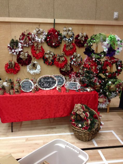 Wreaths galore. 2013 Christmas craft fair. Craft Fair Booth, Wreath Display, Christmas Candle Rings, Market Vendor, Craft Fair Booth Display, Fair Theme, Craft Show Booth, Fair Booth, Craft Fairs Booth