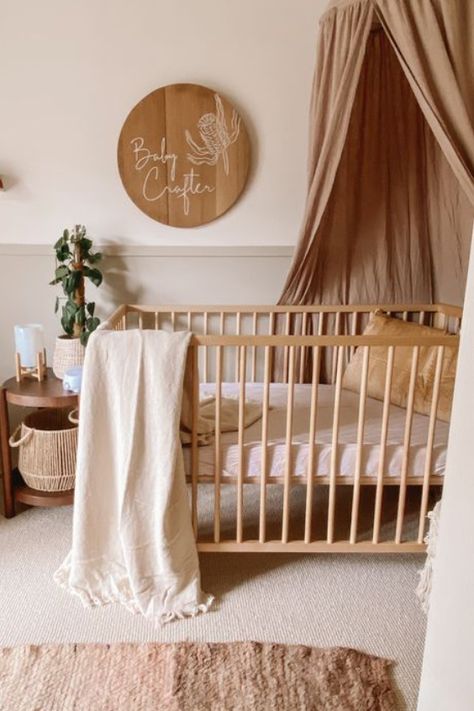 You've chosen the perfect crib for the nursery, but what about the space above the crib? The wall above the crib presents a huge opportunity to take your nursery to the next level. We've rounded up the best ways to decorate above the crib and make a stylish statement. Nursery Feature Wall, Magical Kids Room, Stunning Nursery, Bold Nursery, Dark Nursery, Brown Nursery, Orange Nursery, Crib Wall, Nursery Accents