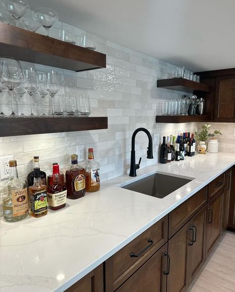 Q Quartz Calacatta Elysio's white base with warm intricate veining mad it the perfect countertop choice to complement this elevated Pewaukee basement bar. 🥃 Let's face it, every Wisconsin home deserves a bar to truly feel complete! Cheers to creating memorable moments right at home. 🍻  Thanks for sharing @morgan.huron23! 📷 🛠️ One Mechanical Solution LLC  #WisconsinLiving #BasementBar #newcountertops #kgstevens #cheers #wisconsinlife Cosmic Vapor Quartz Countertops, Calacatta Elysio Quartz, Quartz Countertops With Backsplash, Marble Kitchen Cabinets, Kitchen Countertops And Backsplash, Quartz Calacatta, Countertops And Backsplash, Countertop Choices, Countertop Ideas