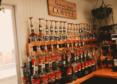 Coffee Shop Syrup Display, Syrup Rack Coffee Shop, Cafe Organization Coffee Shop, Coffee Shop Truck Mobile Cafe, Coffee Shop Organization, Coffee Stand Drive Thru, Snack Shack Ideas, Coffee Shop Trailer, Coffee Trailer Ideas Mobile Cafe