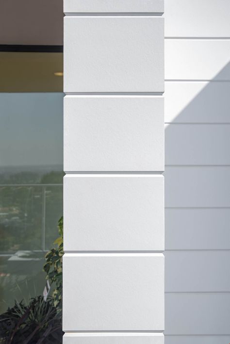 White Siding Left Exterior Wall Groove Line Design, Modern Hardie Board Exterior, White Cladding Exterior, White Horizontal Siding, Vertical Cement Board Siding, White Standing Seam Cladding, Scored Stucco Exterior, Architectural Panel, Modern Siding