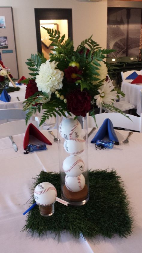 Baseball Themed Wedding Table Centerpiece! #baseballs #astroturf #red #navy #white #roses #dahlias #texasRangers #HallOfFame #sand #Texas #reception #wedding Grooms Table Baseball Theme, Baseball Grooms Table, Baseball Rehearsal Dinner Ideas, Baseball Wedding Centerpieces, Softball Wedding, Baseball Themed Wedding, Baseball Centerpiece, Baseball Banquet, Banquet Centerpieces