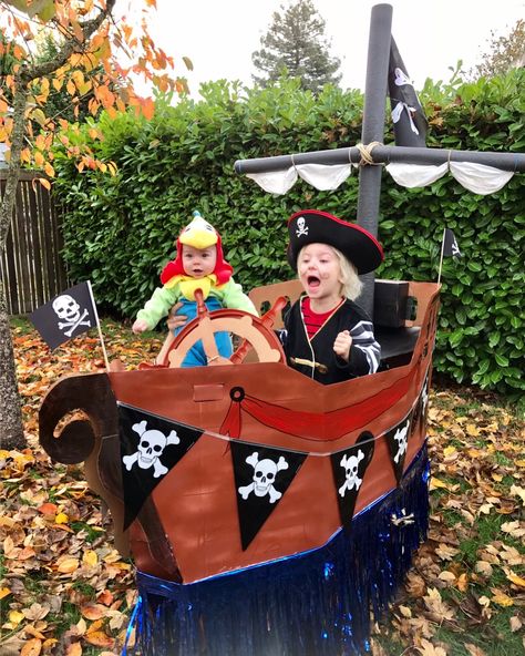 My grandsons and their pirate ship float red wagon heading out to pillage the neighborhood for candy booty! 🎃 Pirate Wagon, Pirate Ship Wagon, Pirate Ships Diy, Wagon Floats, Mardi Gras Parade Float, Hay Wagon, Dungaree Outfit, Polo Bodysuit, Homecoming Floats