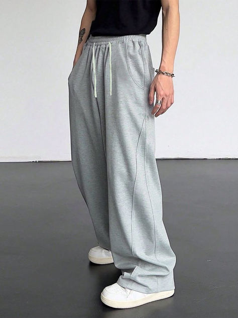 Upgrade your casual wardrobe with our ultra-comfortable grey sweatpants. Made from soft, breathable fabric, these sweatpants are perfect for lounging at home, running errands, or hitting the gym. The versatile grey color pairs effortlessly with any outfit, making them a must-have staple. Grey sweatpants, men's sweatpants, women's sweatpants, casual wear, lounge pants, athletic wear, gym apparel, comfortable sweatpants, everyday wear, breathable sweatpants, Toji,  Gojo, Killua Outfits With Grey Sweatpants, Silk Wide Leg Pants, Gray Sweatpants, Baggy Sweatpants, Grey Sweats, Sweatpants Outfit, Jogging Bottoms, Grey Sweatpants, Summer Suits